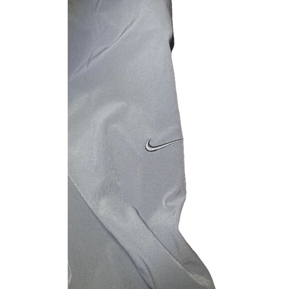 Medium Nike unlimited Men’s Dri-Fit Zip Cuff Versatile Pants Smoke Grey - Picture 4 of 8